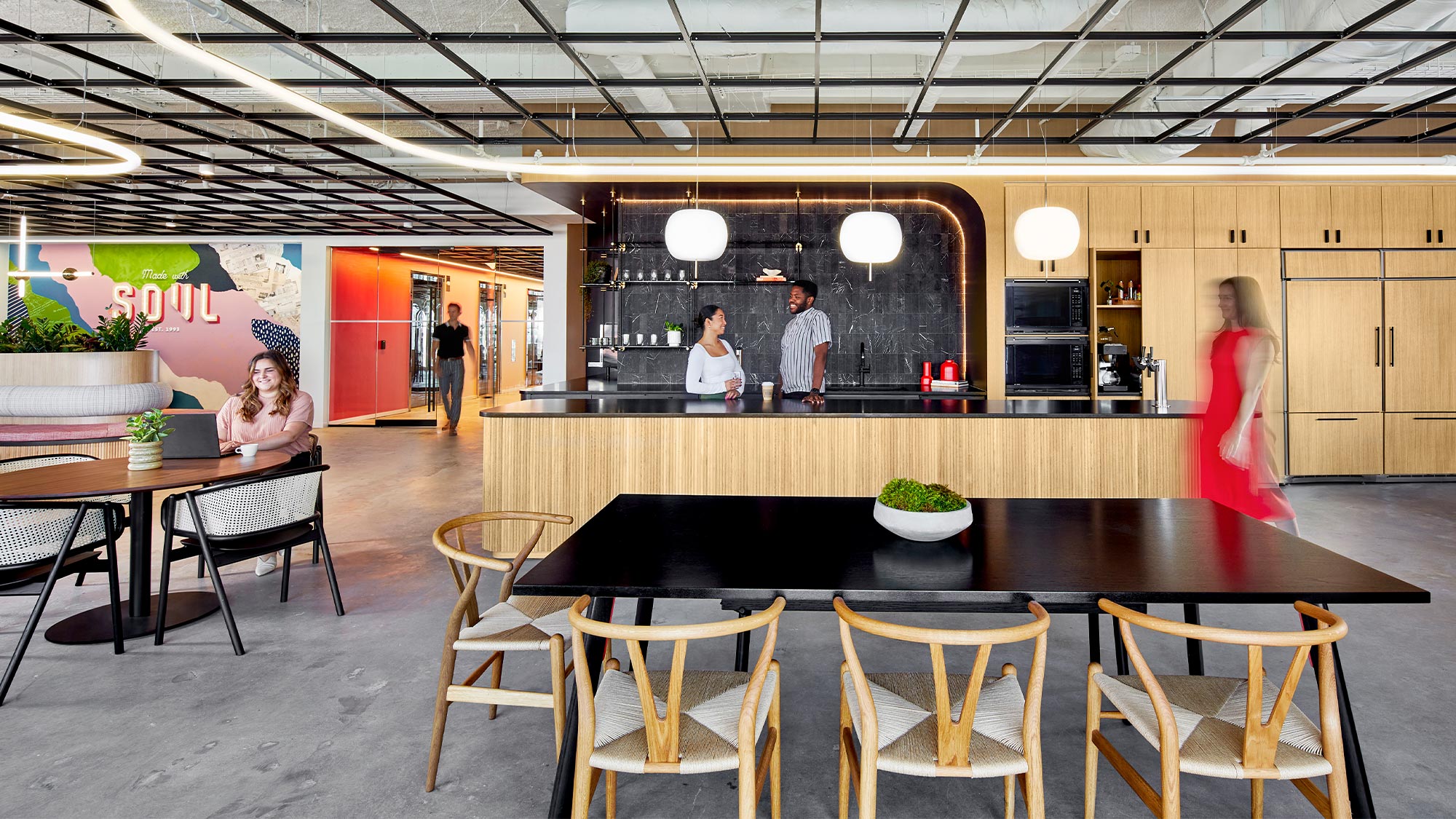 A group of people in a restaurant.