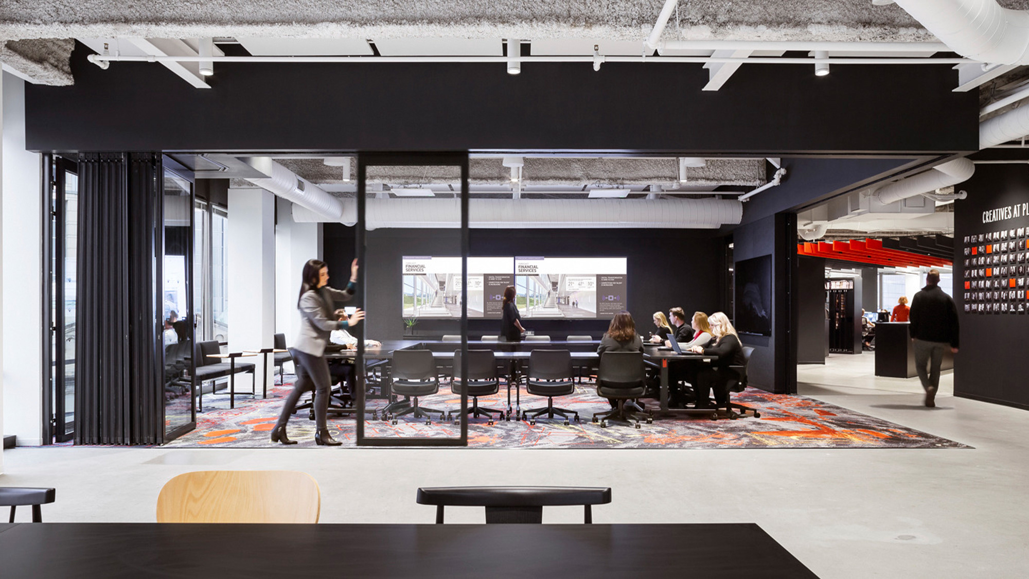 A group of people in a room.