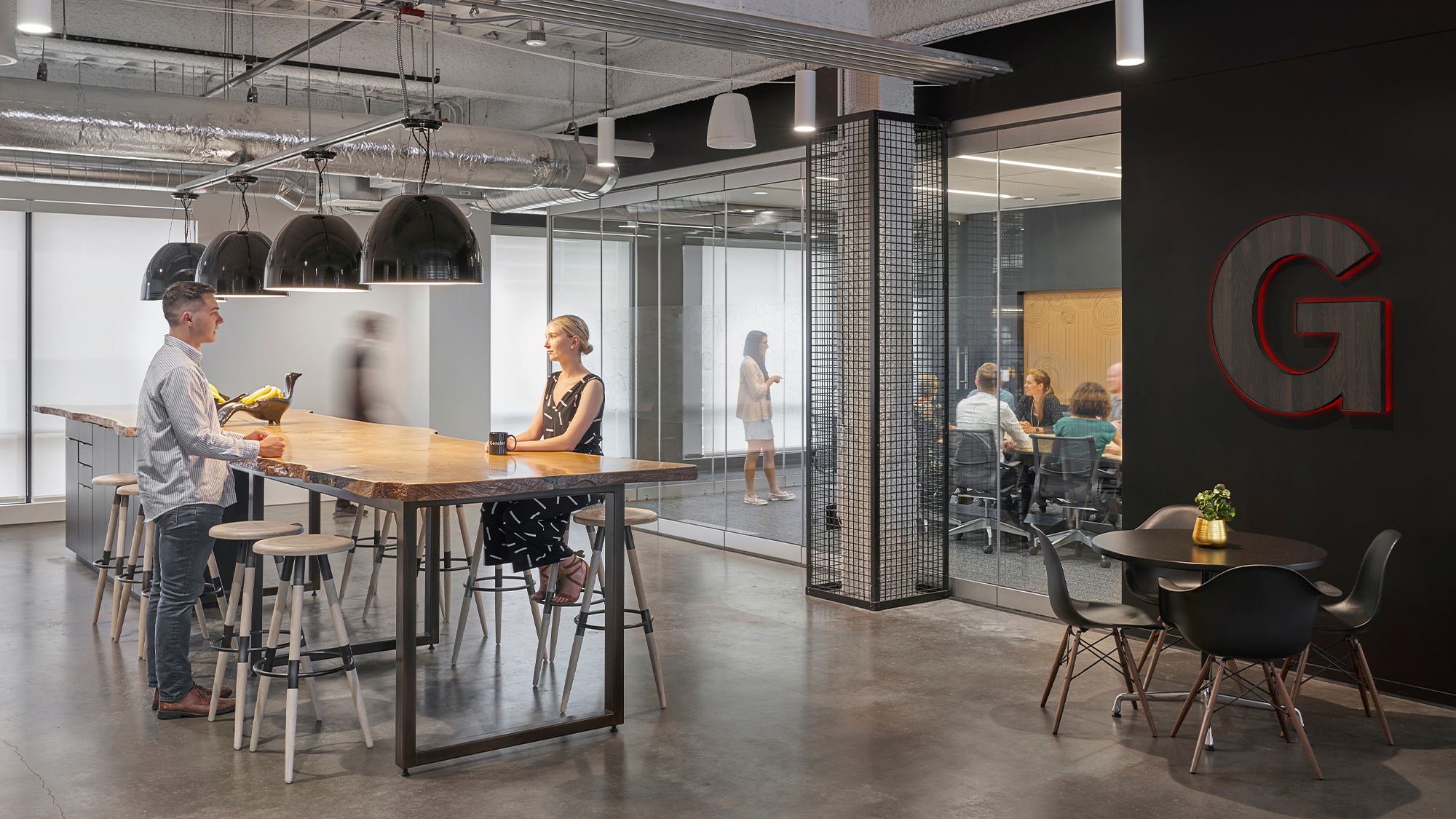 A group of people in a restaurant.