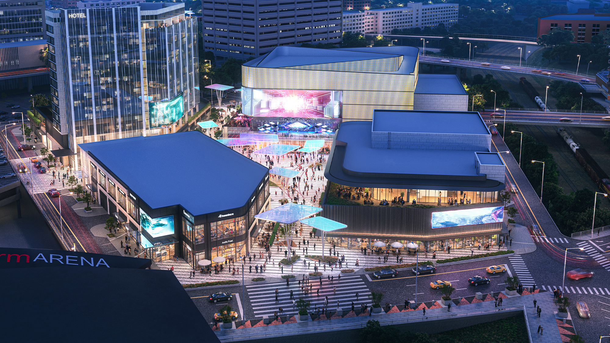 A city with a large building and a large courtyard with a large crowd.