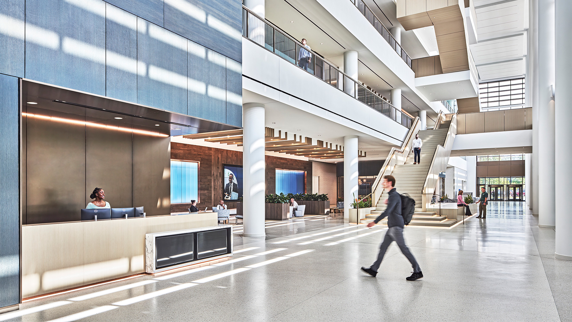 A man walking down a hall.