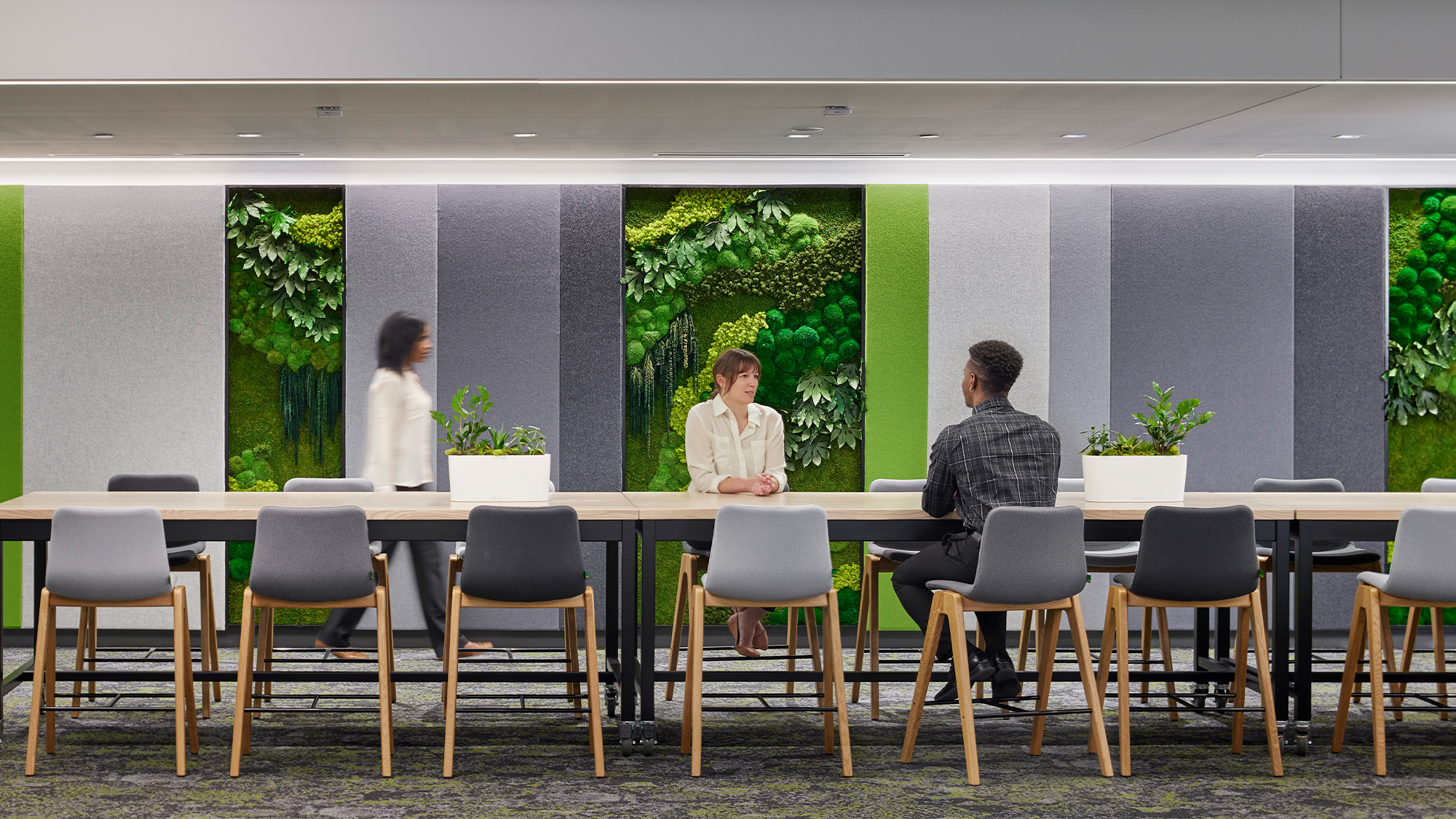 A group of people sitting at a table.