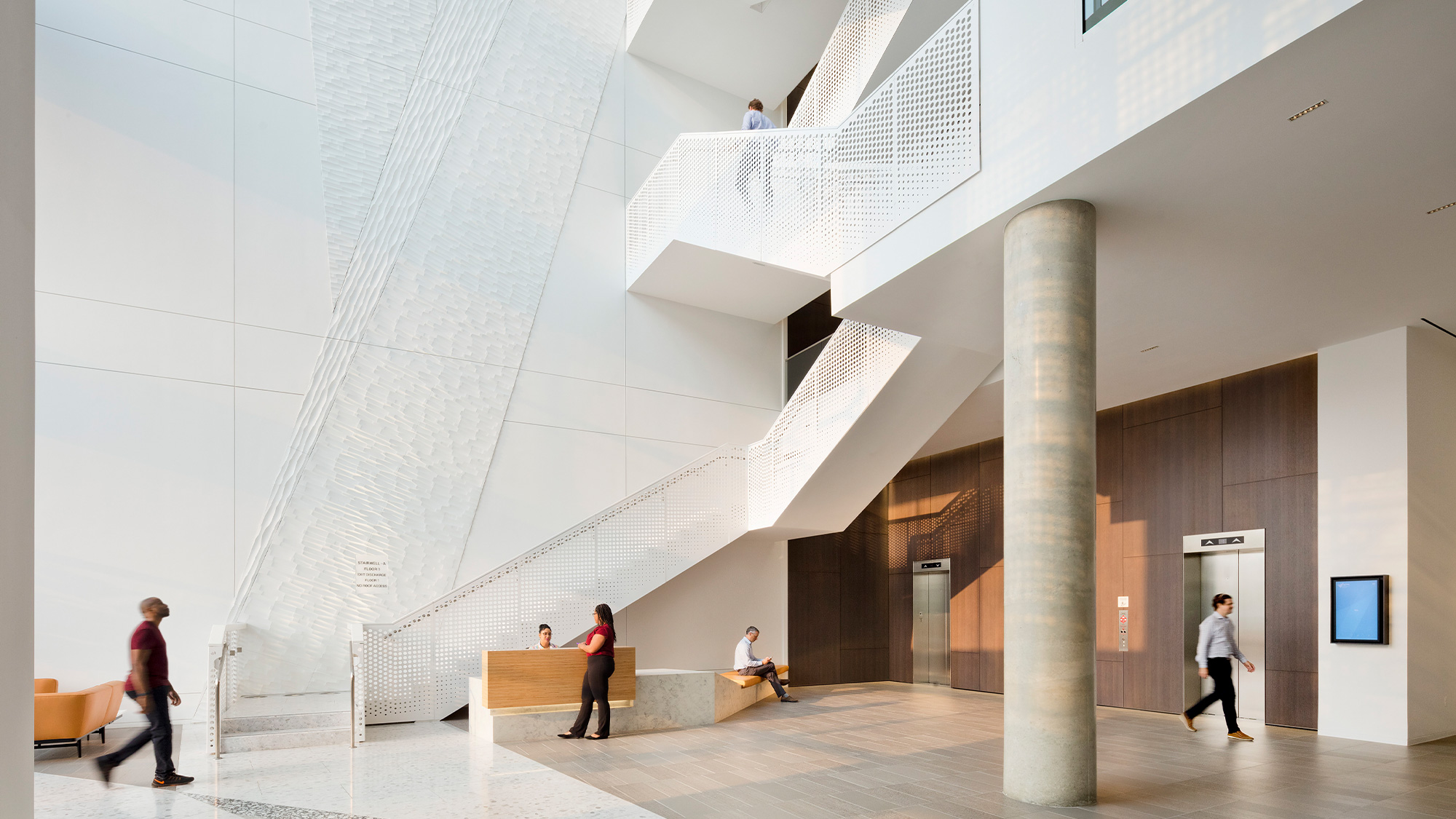 People walking in a building.
