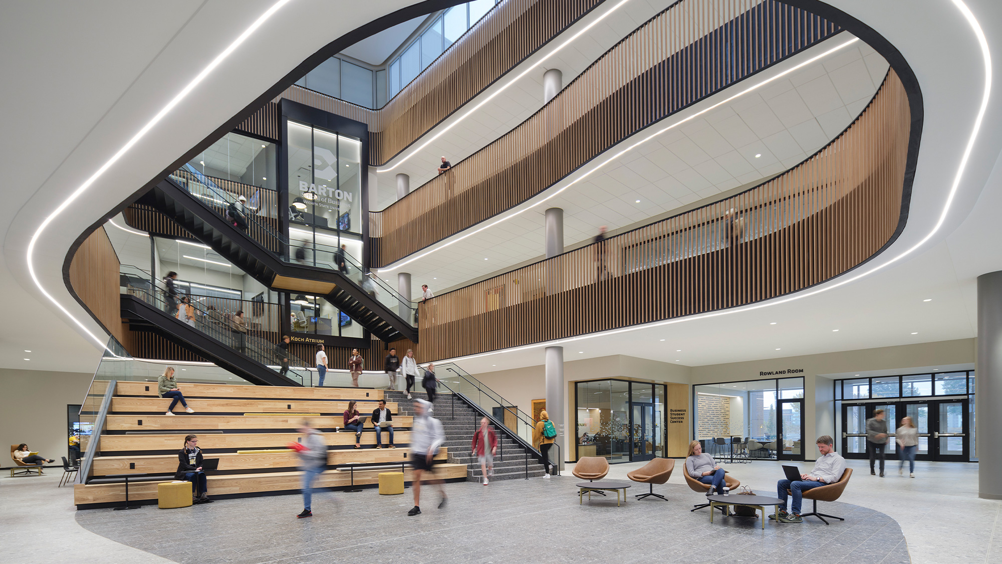 Exterior approach towards entrance of Wichita State University Barton School of Business.