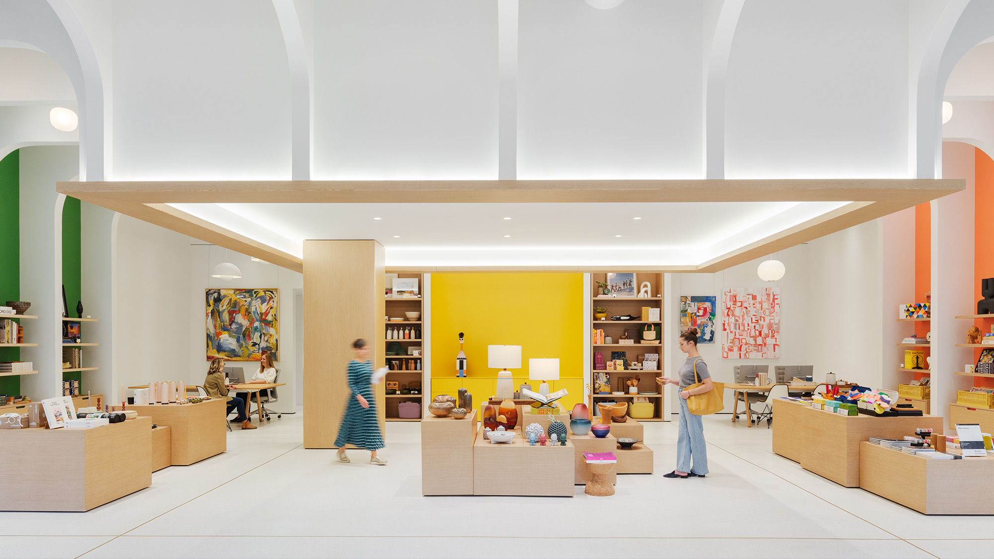 A room with a few people.