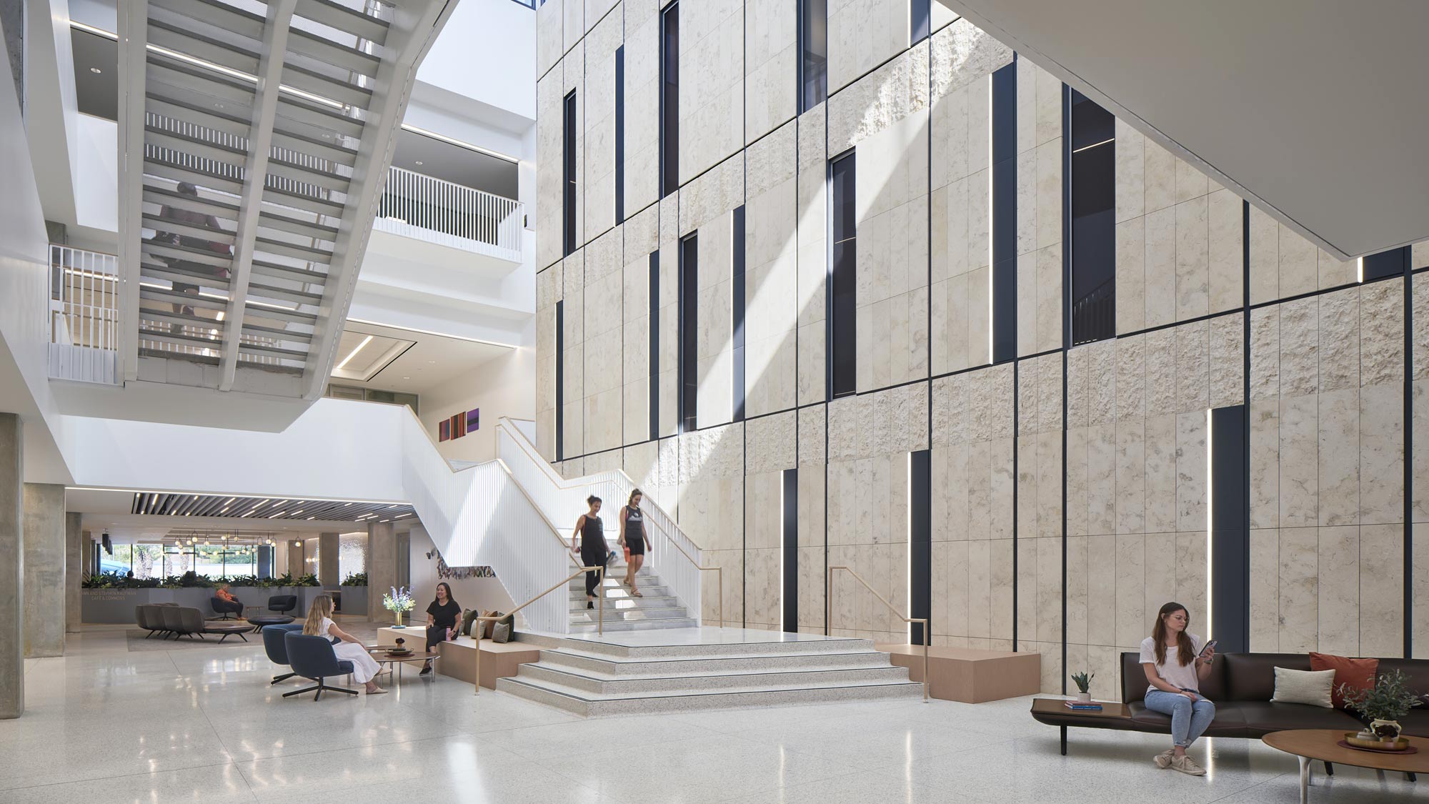 A group of people in a building.